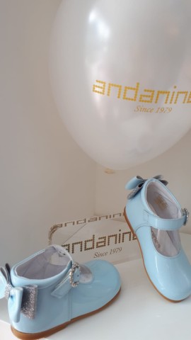 Andanines Blue Patent shoes with double bow at heel 