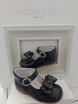 Andanines navy patent high back shoes with glitter bow