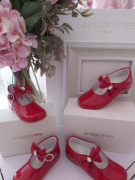 Andanines Red patent low back shoe with diamante bow 